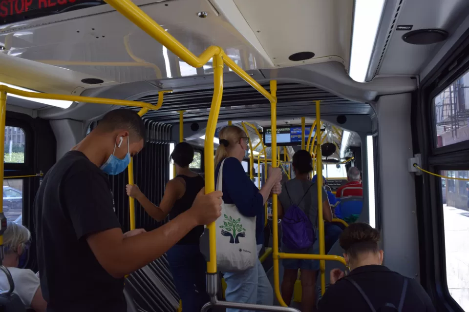 Bus riders wearing masks on a New York City bus